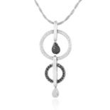 A BLACK AND WHITE DIAMOND PENDANT in 18ct white gold, comprising of circular motif drops jewelled