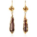 A PAIR OF ANTIQUE GARNET AND PEARL EARRINGS in high carat yellow gold, each set with a long drop