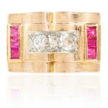 AN ART DECO RUBY AND DIAMOND RING, CIRCA 1940 in yellow gold, set with three old cut diamonds and