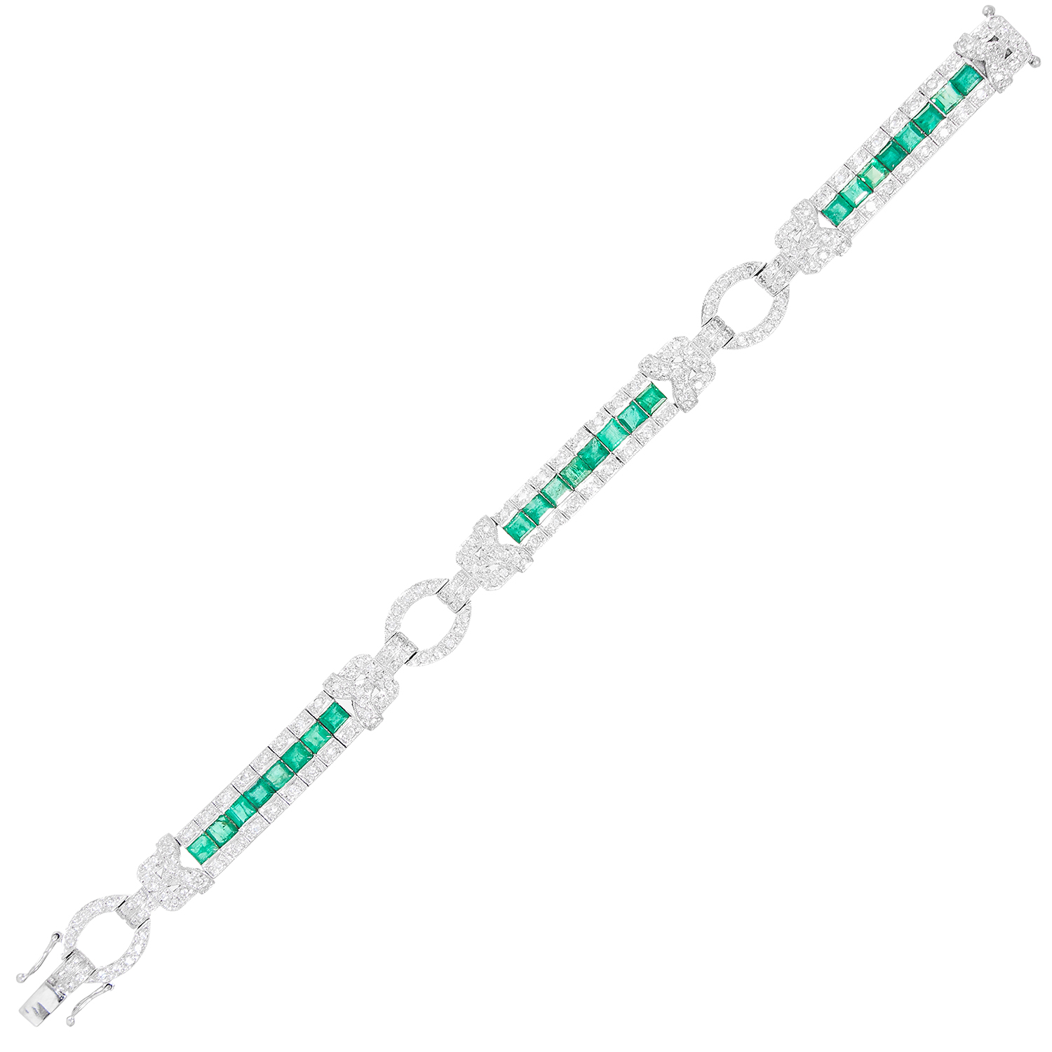 AN ANTIQUE EMERALD AND DIAMOND BRACELET in white gold or platinum, comprising three emerald and