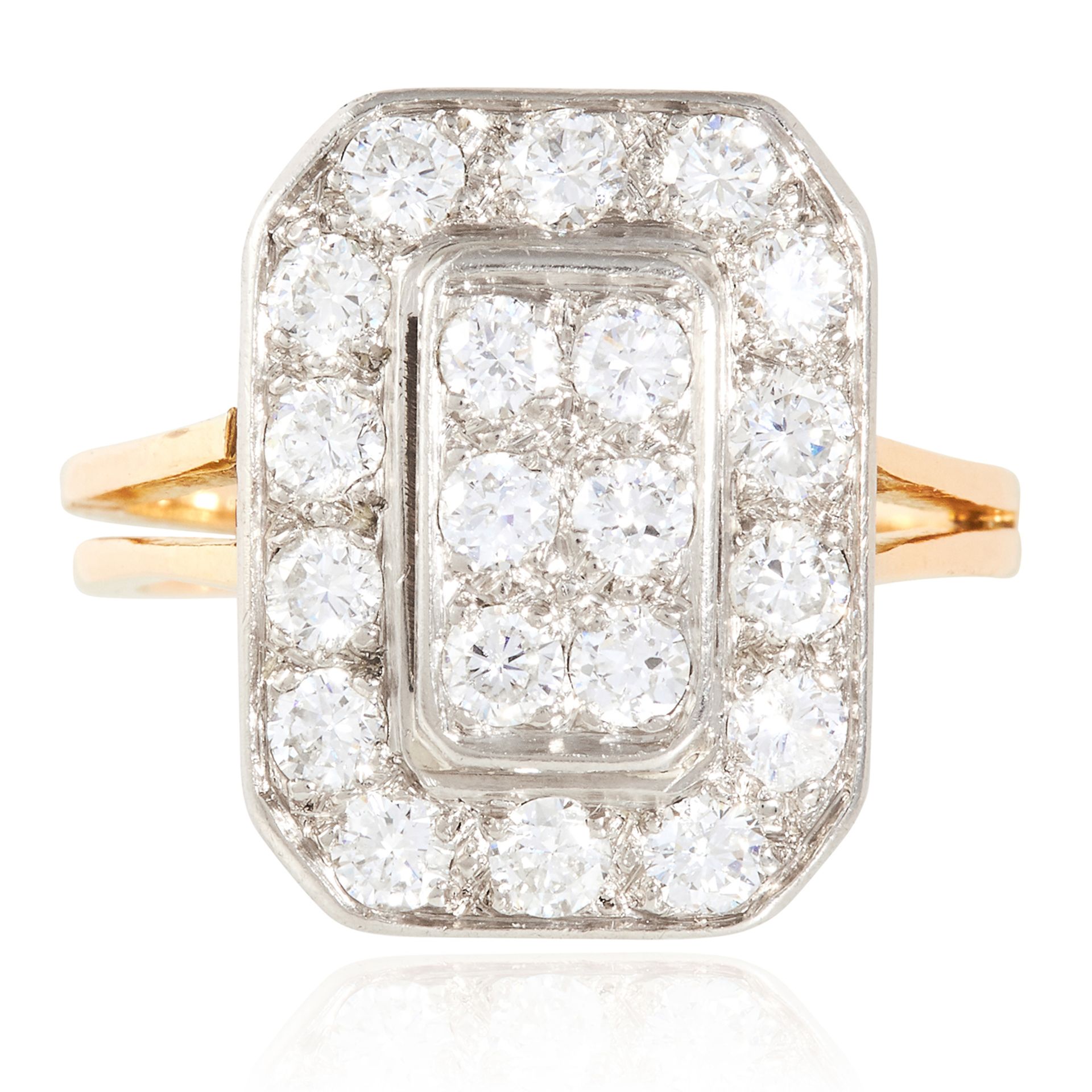 AN ANTIQUE ART DECO DIAMOND RING in 18ct yellow and platinum, the octagonal face jewelled with round