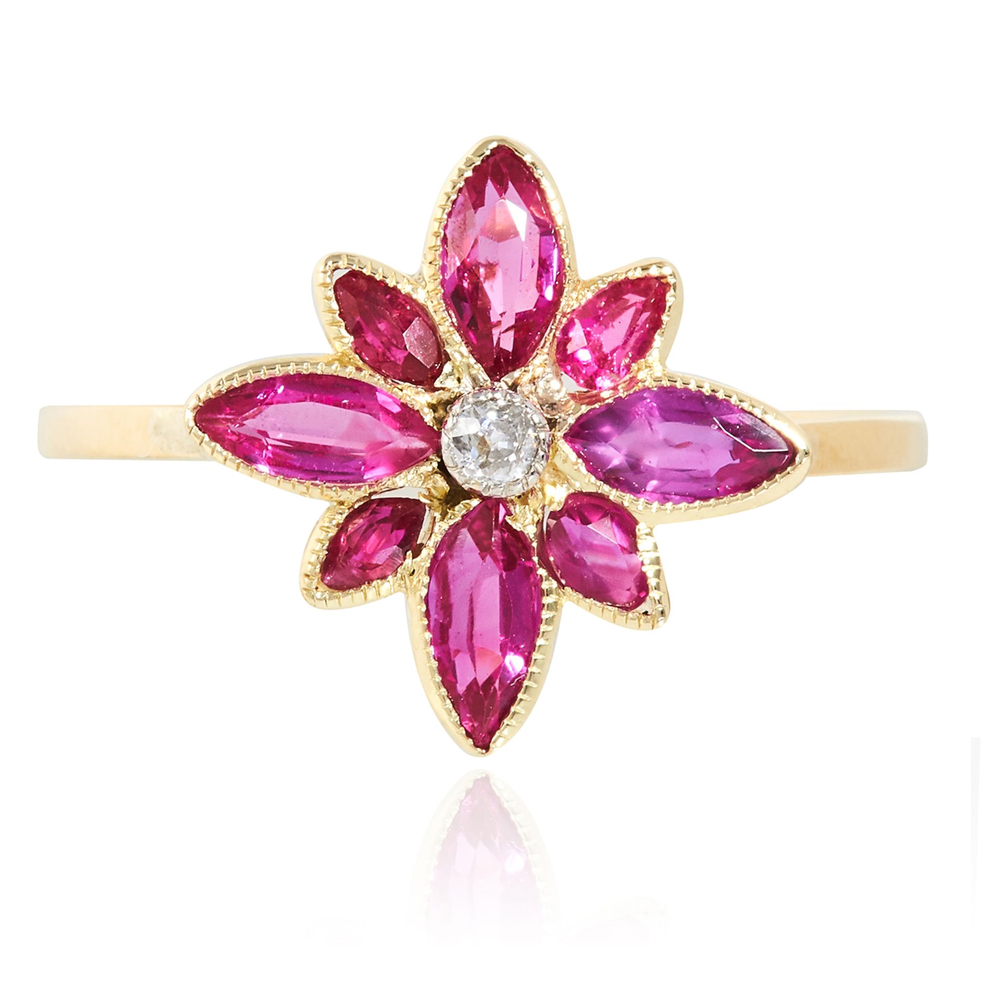 A RUBY AND DIAMOND RING in high carat yellow gold, set with a floral cluster of rubies and diamonds,