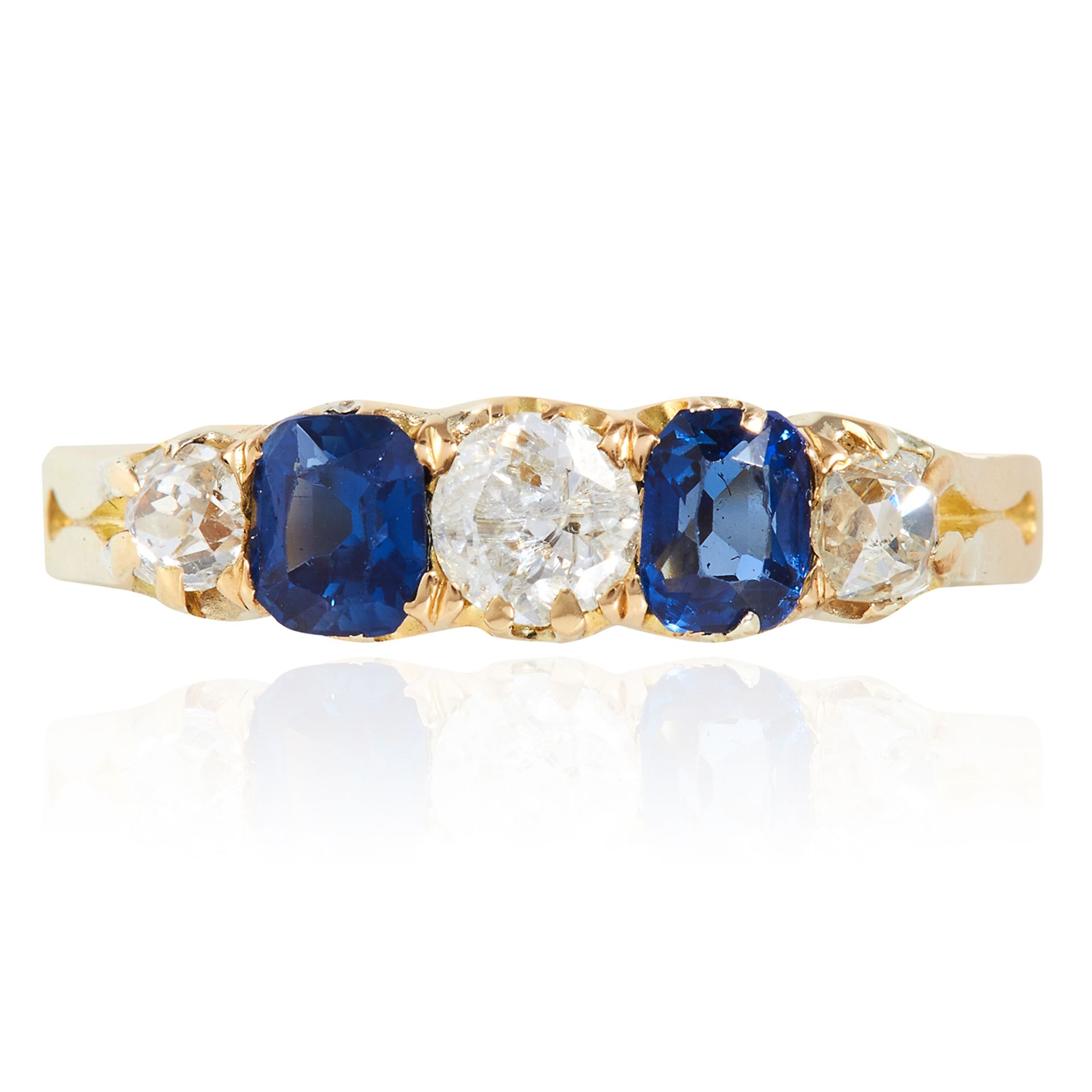 AN ANTIQUE SAPPHIRE AND DIAMOND RING in 18ct yellow gold, set with alternating oval cut sapphires