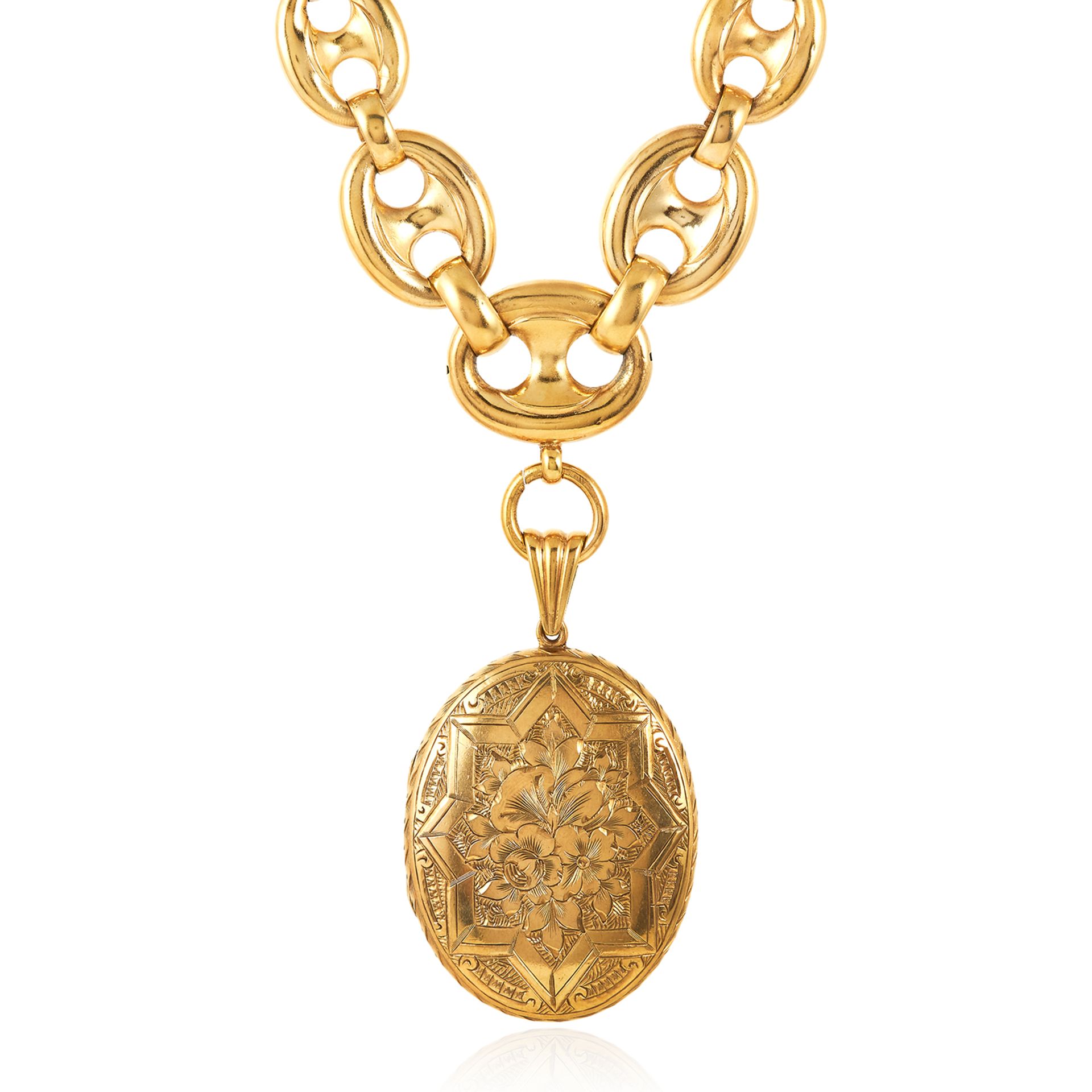 AN ANTIQUE LOCKET AND CHAIN comprising of an oval locket engraved with foliate and star motif, on