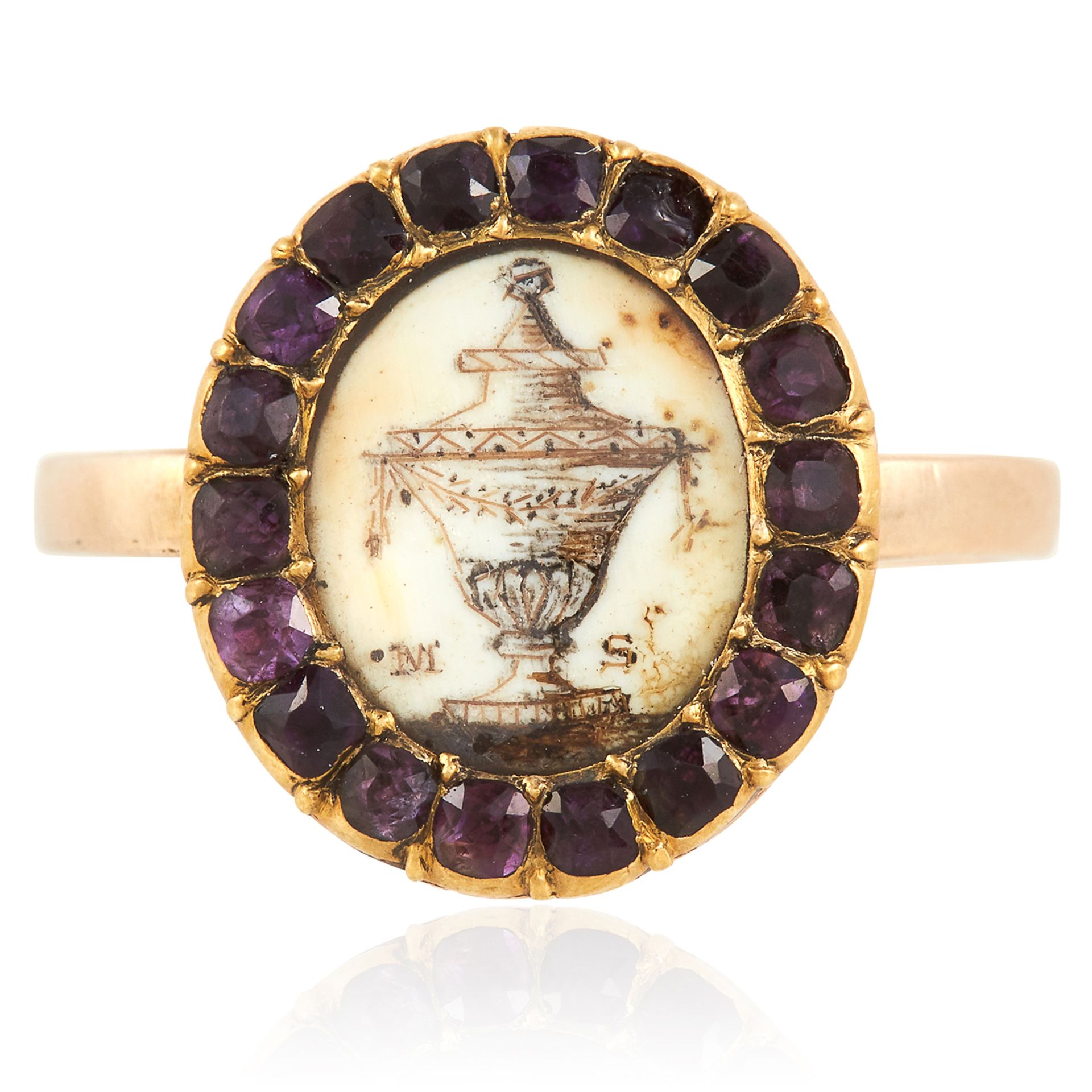AN ANTIQUE GEORGIAN MINIATURE AND GARNET MOURNING RING, 18TH CENTURY in high carat yellow gold,