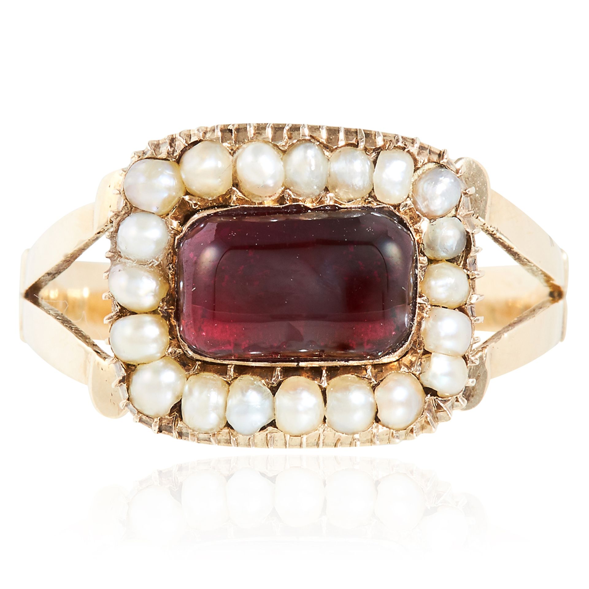 AN ANTIQUE GARNET AND PEARL RING, 19TH CENTURY in high carat yellow gold, the rectangular cabochon