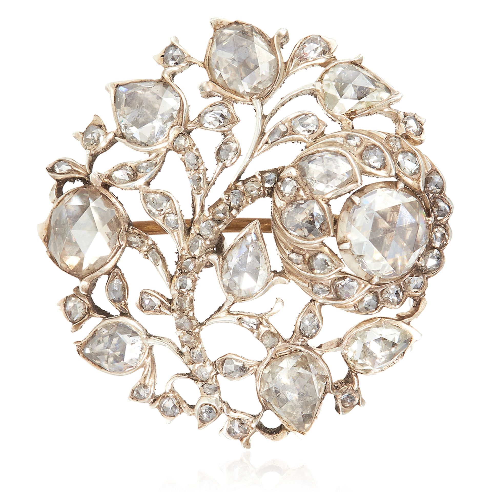 AN ANTIQUE DIAMOND BROOCH, 19TH CENTURY possibly Colonial, of circular form with foliate and