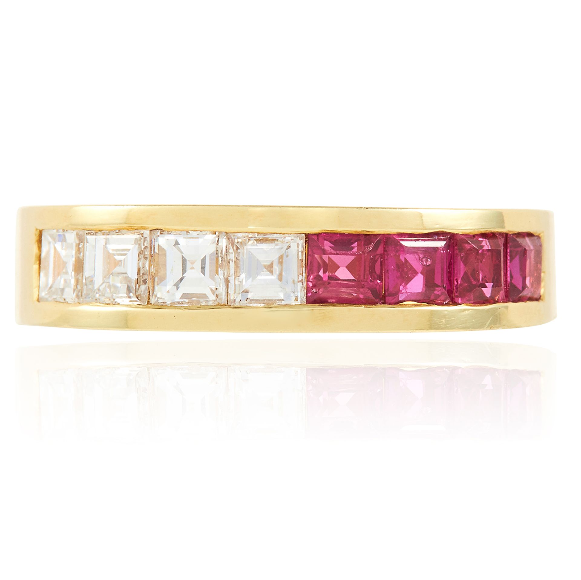 A RUBY AND DIAMOND HALF ETERNITY STACK RING in 18ct yellow gold, the squared band set with a row
