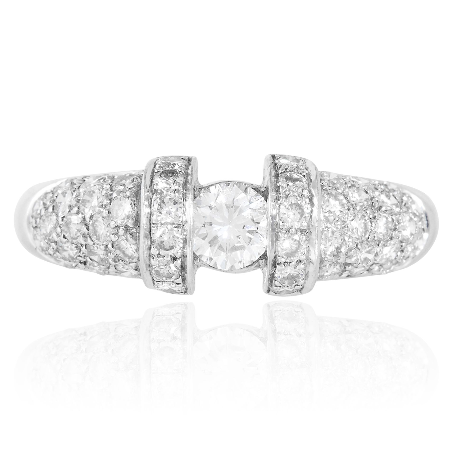 A DIAMOND DRESS RING in platinum, set with a round cut diamond of approximately 0.25 carats and