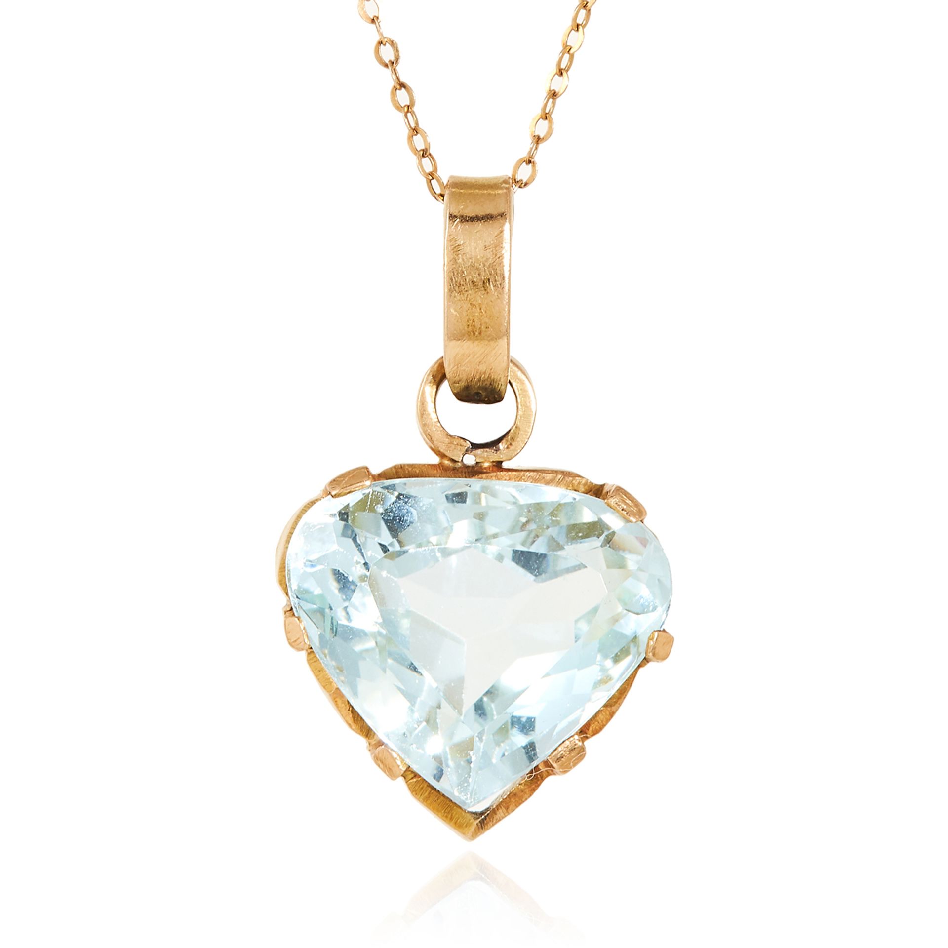 AN ANTIQUE AQUAMARINE PENDANT in yellow gold, set with a heart cut aquamarine, marked