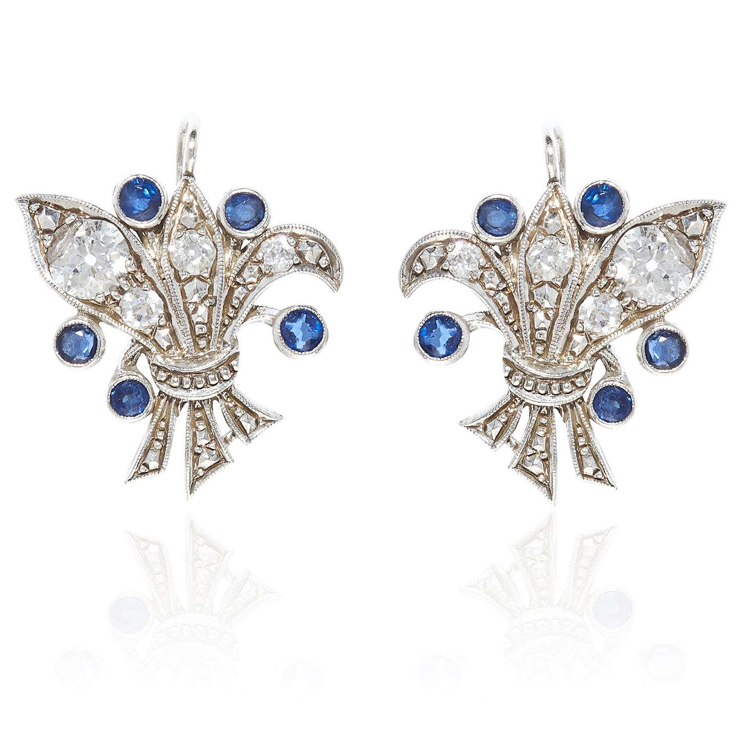 A PAIR OF SAPPHIRE AND DIAMOND EARRINGS in white gold, set with round cut diamonds and sapphires,