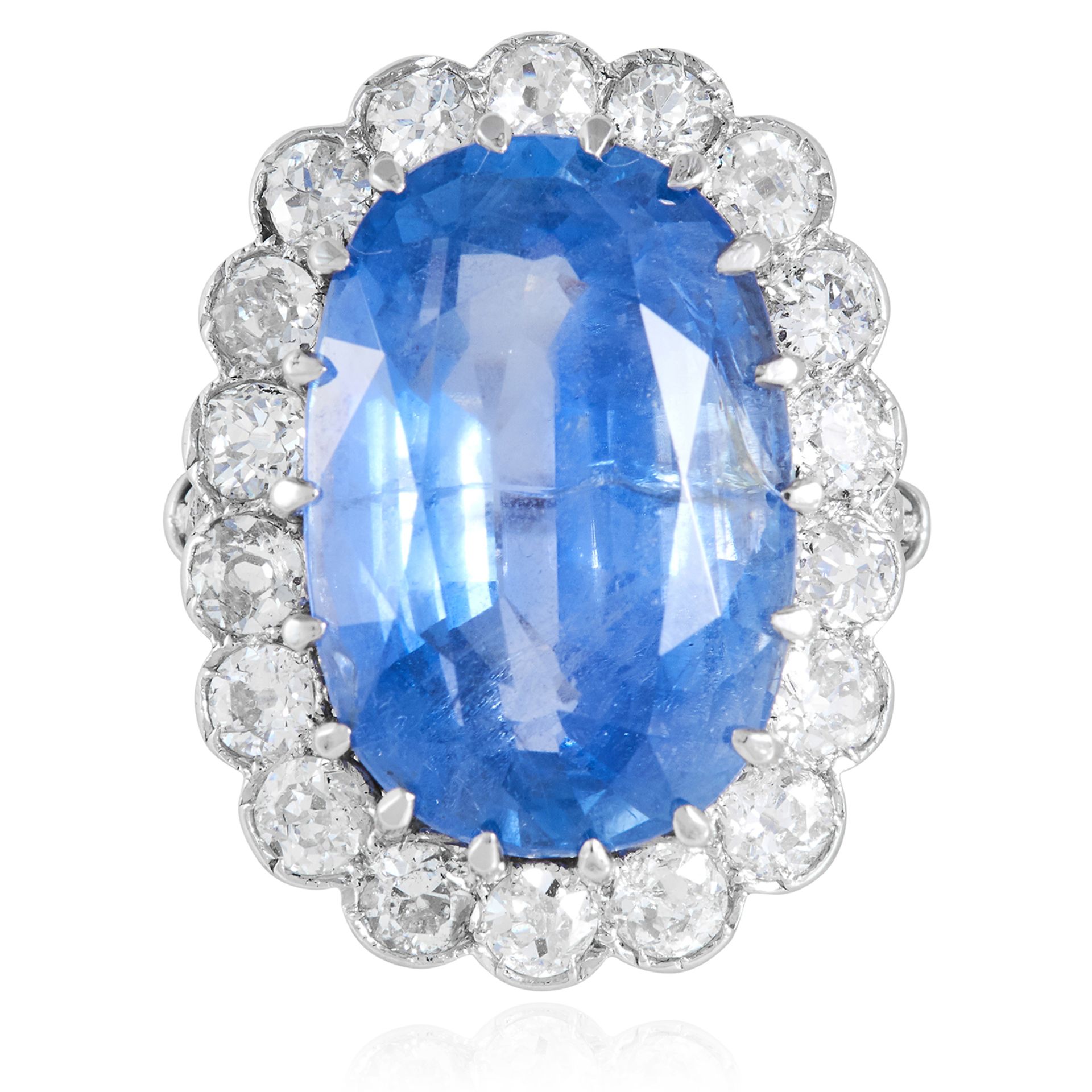 A 20.53 CARAT CEYLON NO HEAT SAPPHIRE AND DIAMOND CLUSTER RING in white gold or platinum, set with a