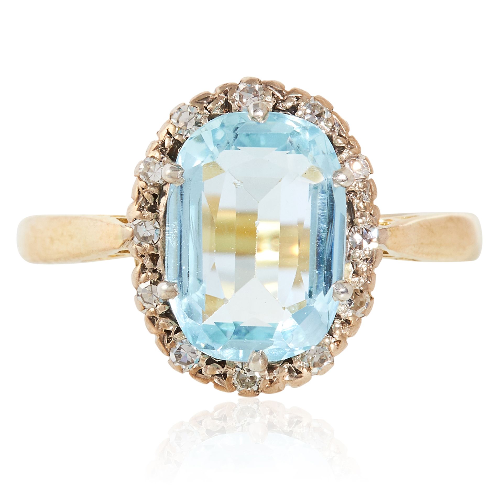 AN AQUAMARINE AND DIAMOND CLUSTER RING in yellow gold, set with a cushion cut aquamarine of