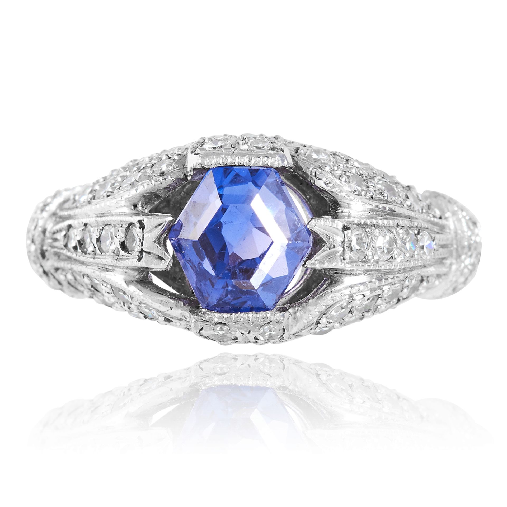 A 1.98 CARAT SAPPHIRE AND DIAMOND DRESS RING in platinum, set with a hexagonal cut sapphire of