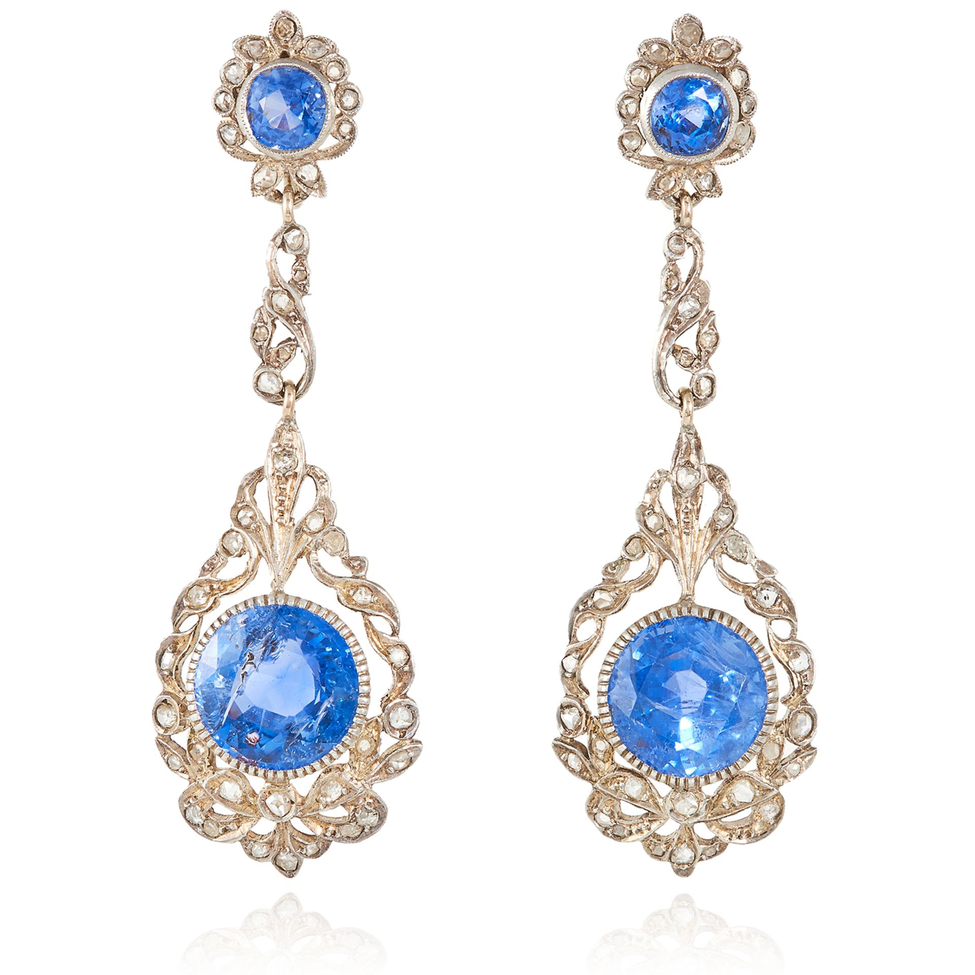 A PAIR OF ANTIQUE CEYLON NO HEAT SAPPHIRE AND DIAMOND EARRINGS in yellow gold and silver, the