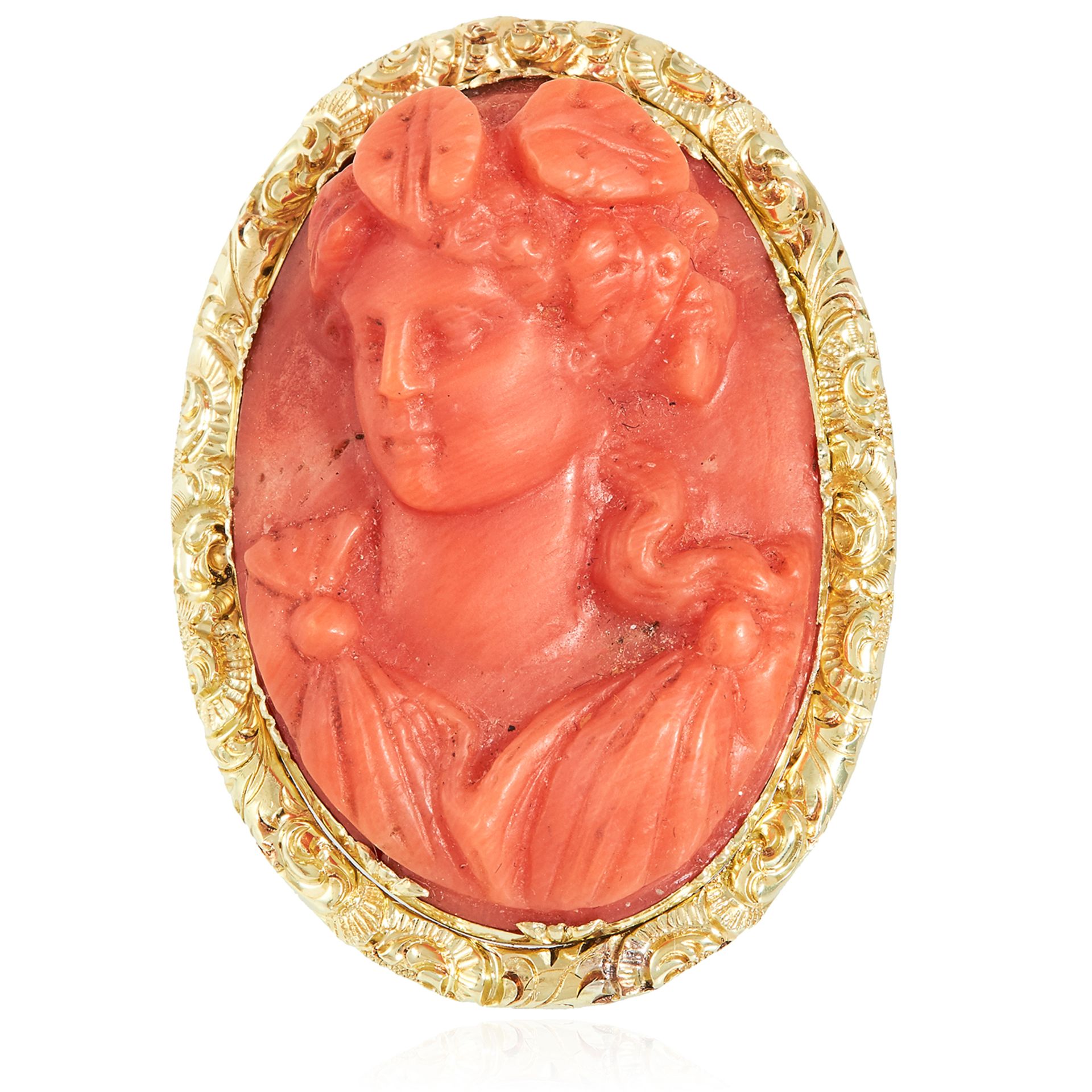 AN ANTIQUE CARVED CORAL CAMEO RING, 19TH CENTURY in high carat yellow gold, the large oval cameo