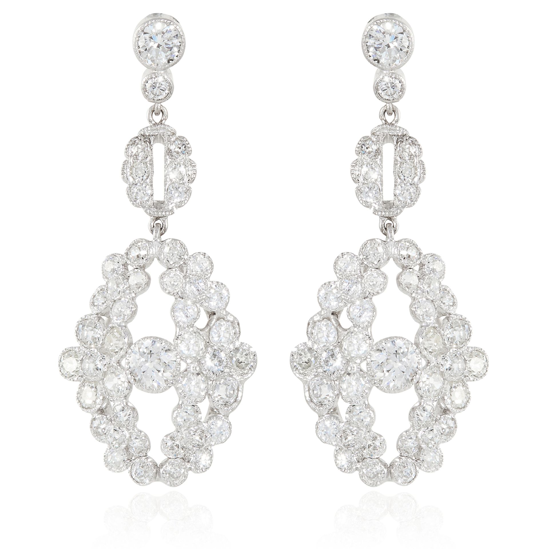A PAIR OF ANTIQUE 5.25 CARAT DIAMOND EARRINGS in 18ct white gold, each set with a principal old