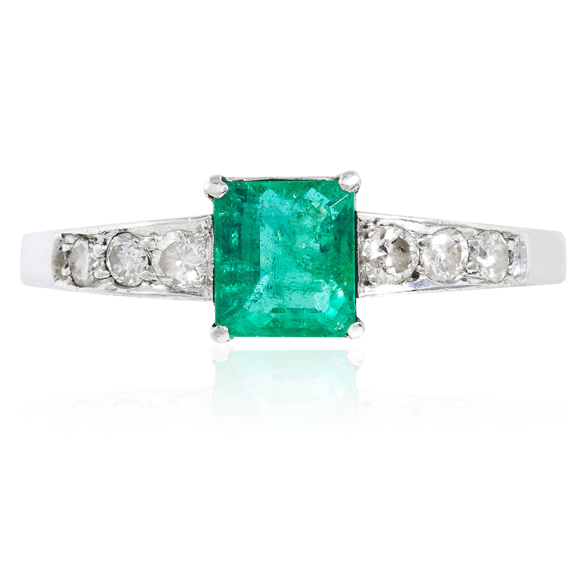 AN EMERALD AND DIAMOND RING in platinum or white gold, the central step cut emerald of 0.85 carats