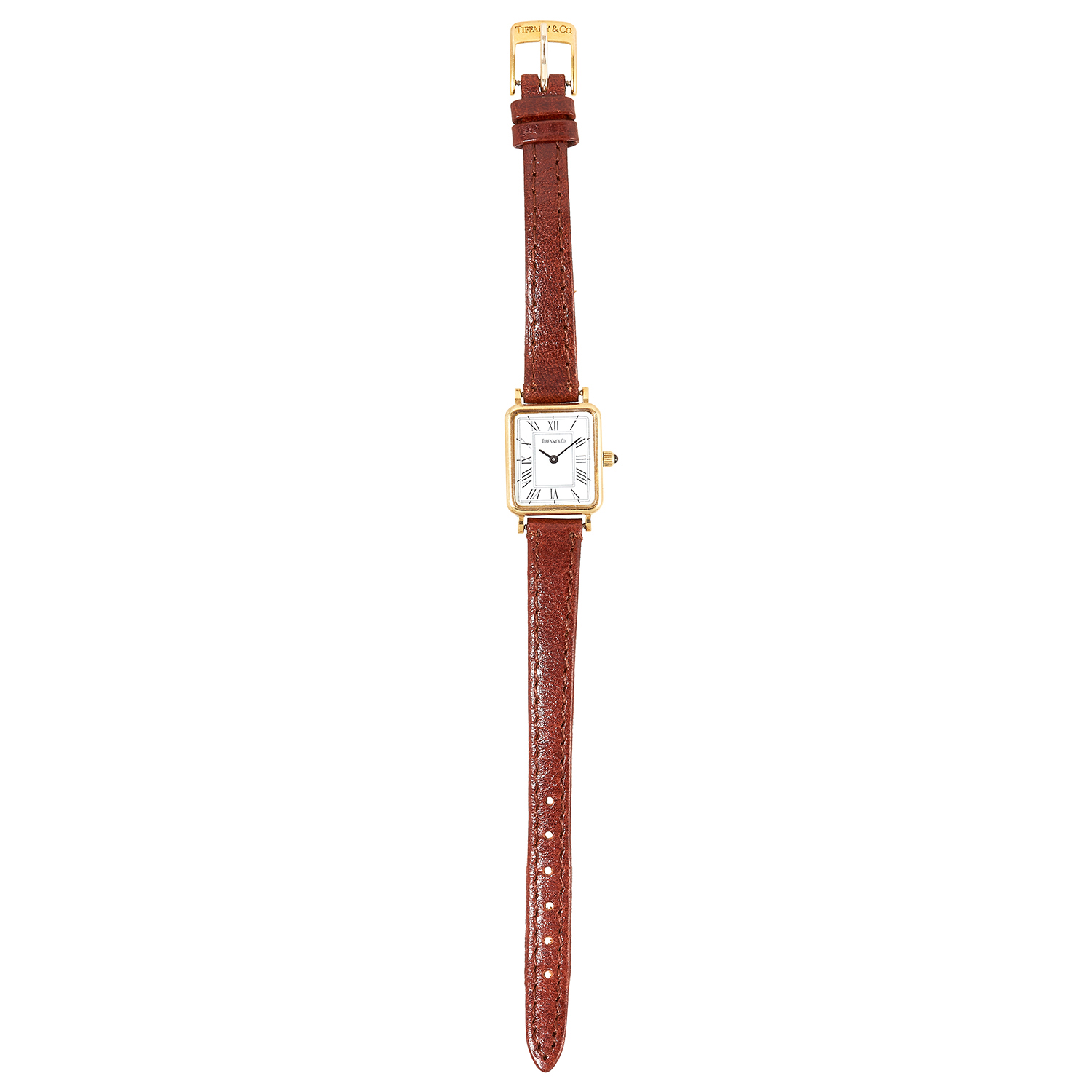 A LADIES WRISTWATCH, TIFFANY AND CO in 14ct yellow gold, with white dial in yellow gold case, on