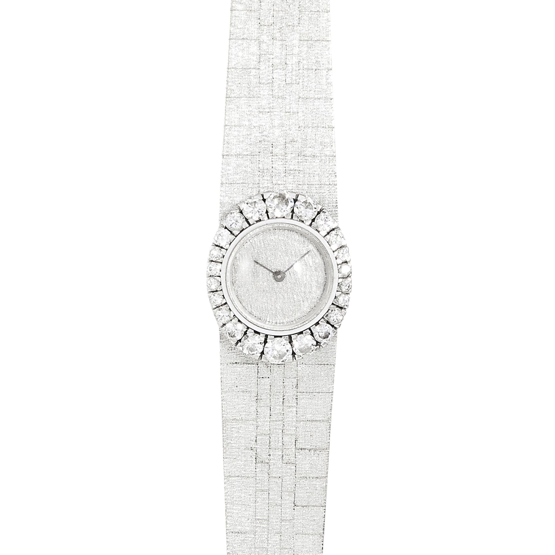 A DIAMOND LADIES WRISTWATCH in 18ct white gold, set with round cut diamonds around the dial - Bild 2 aus 2