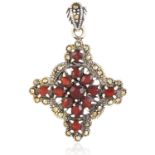 A RED GEMSTONE AND MARCASITE CROSS PENDANT in sterling silver, set with round and oval cut red