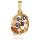 A BLUE AND WHITE GEM SET PENDANT in yellow gold, set with four round cut blue gemstones and three