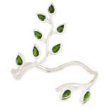 A DIOPSIDE LEAF BANGLE in sterling silver, comprising of an openwork bangle depicting leaves set