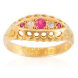 A RUBY AND DIAMOND RING in 18ct yellow gold, set with three round cut rubies and two rose cut