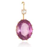 AN AMETHYST AND PEARL PENDANT in yellow gold, set with a pearl and an oval cut amethyst, unmarked,