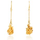 A PAIR OF GOLD EARRINGS in yellow gold, suspending an abstract gold design from a chain, unmarked,