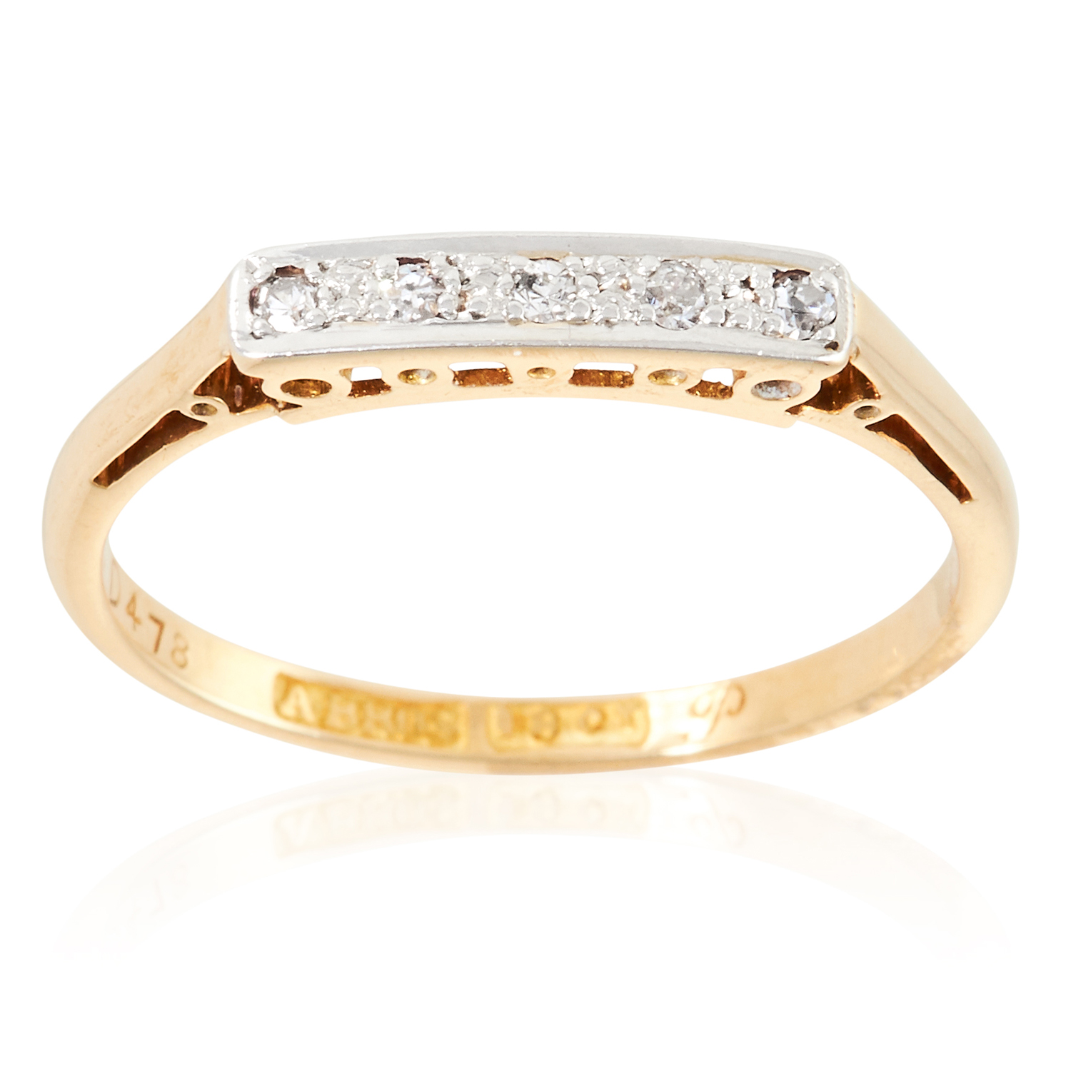 A DIAMOND DRESS RING in 18ct yellow gold, set with five round cut diamonds, stamped 18CT, size P /