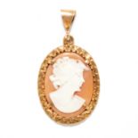 AN ANTIQUE CAMEO PENDANT in yellow gold, set with a cameo depicting a lady, British hallmarks, 3.