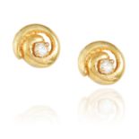 A PAIR OF DIAMOND EAR STUDS in yellow gold, each set with a round cut diamond, unmarked, 0.88g.