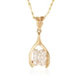 A CUBIC ZIRCONIA '18' PENDANT in yellow gold, set with cubic zirconia '18' in wishbone border,