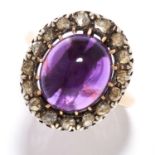 ANTIQUE AMETHYST AND DIAMOND RING in high carat yellow gold and silver, the oval cabochon amethyst
