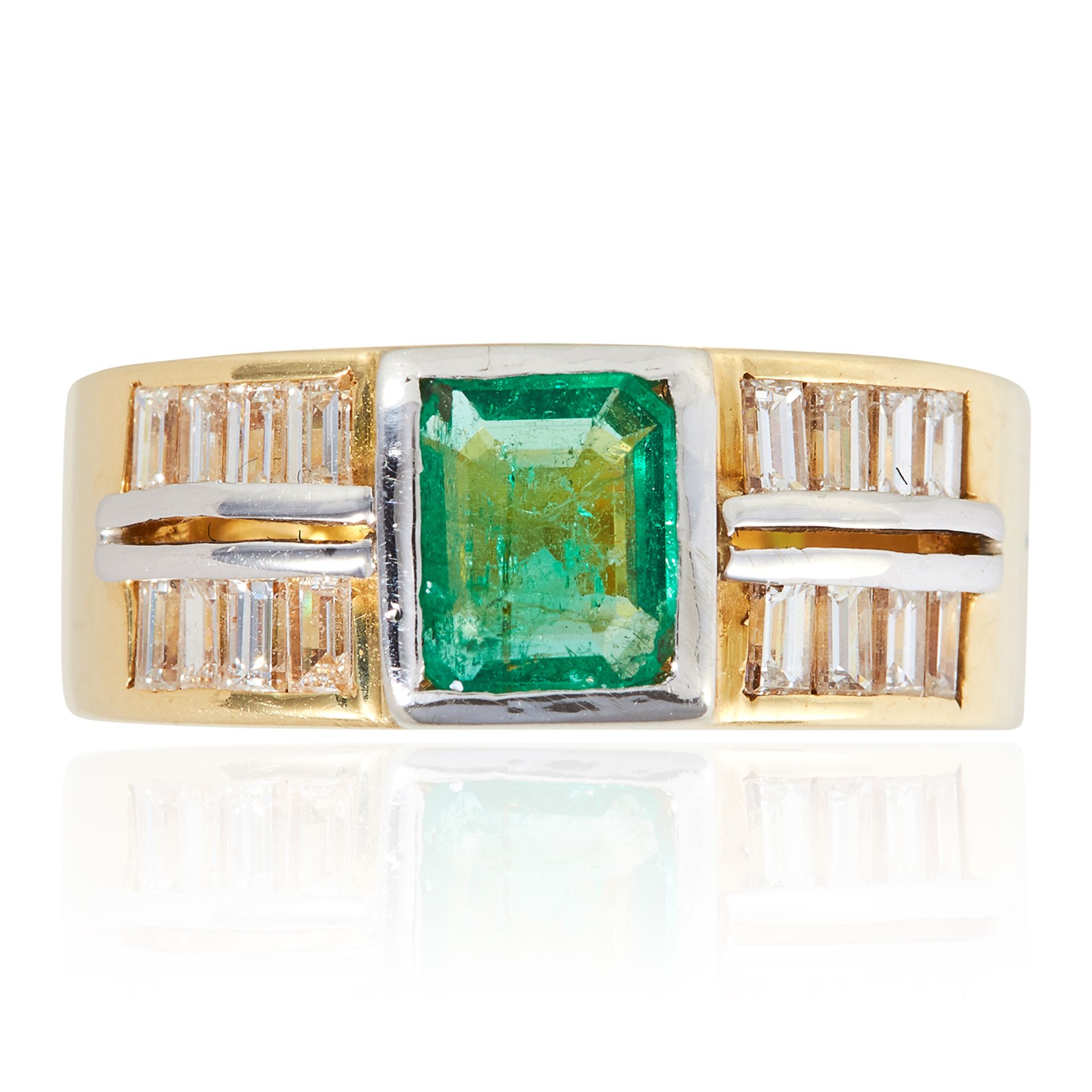 AN EMERALD AND DIAMOND RING in 18ct yellow gold, the step cut emerald set between rows of eight