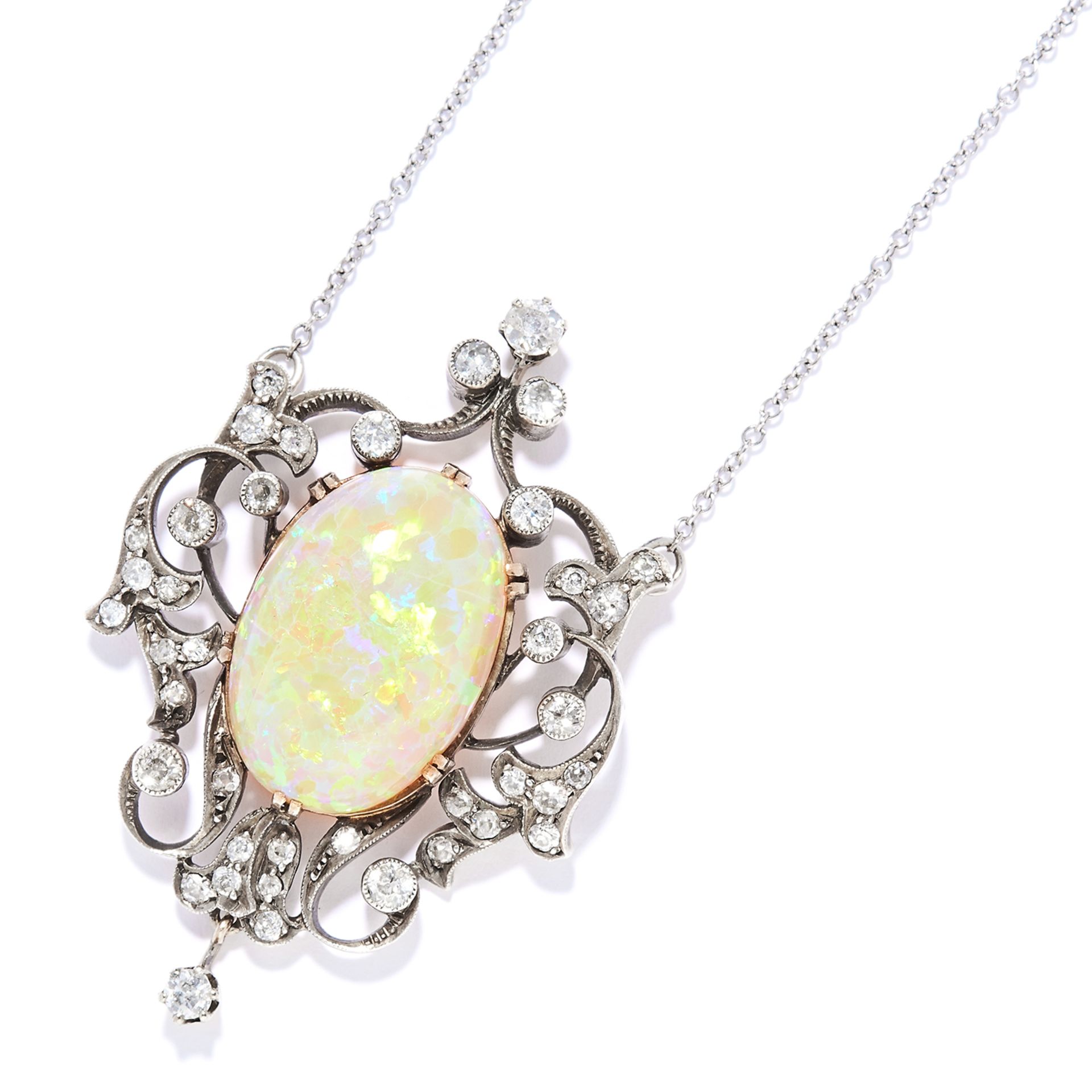 ANTIQUE OPAL AND DIAMOND PENDANT NECKLACE in yellow gold and silver, the oval cabochon opal of 18.56