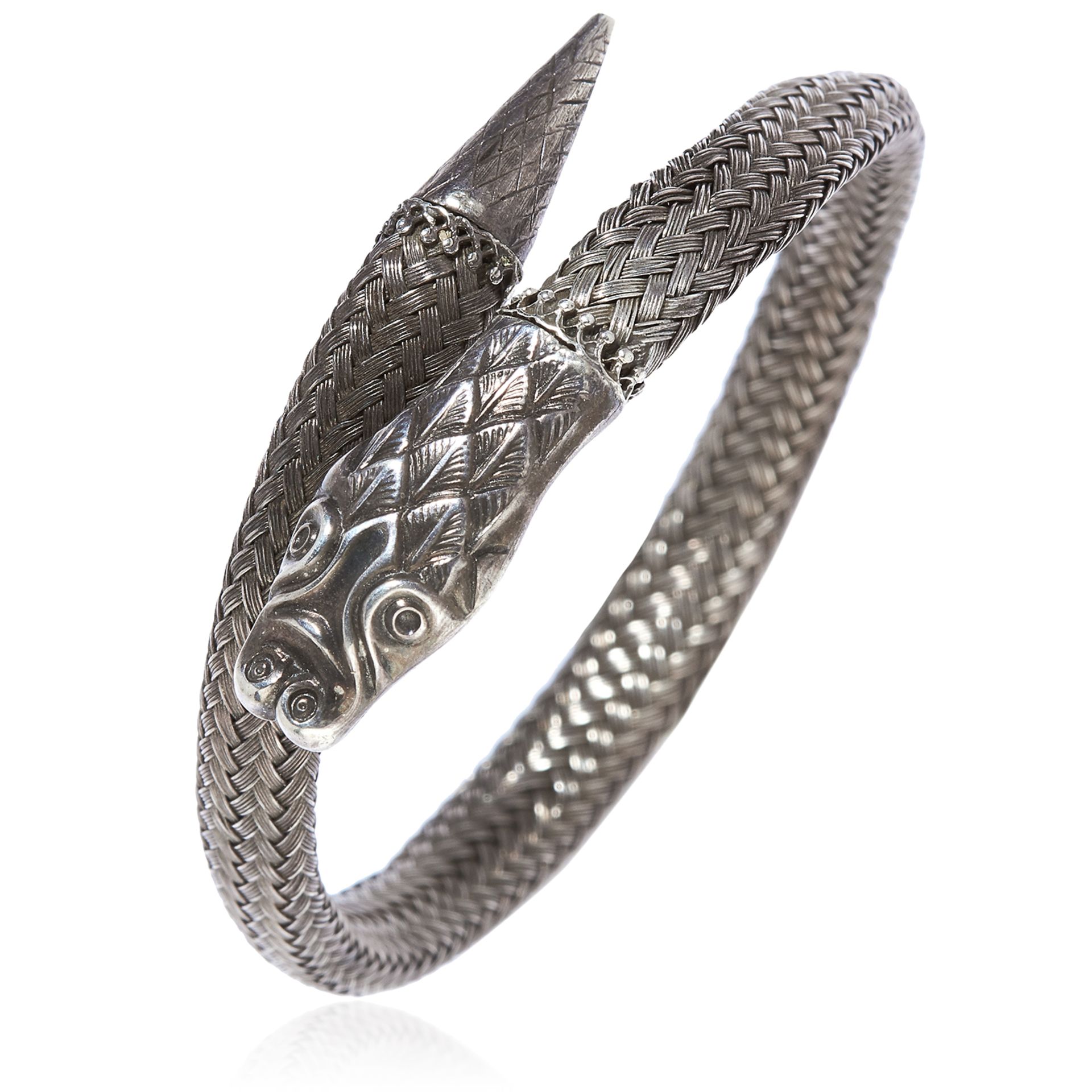 AN ANTIQUE SILVER SNAKE BANGLE in sterling silver, depicting a snake coiled around itself, unmarked,