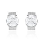 A PAIR OF 0.32 CARAT DIAMOND EAR STUDS in 18ct white gold, each set with a round cut diamond