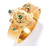 ANTIQUE EMERALD BANGLE, 19TH CENTURY in high carat yellow gold, the band with engraved decoration,