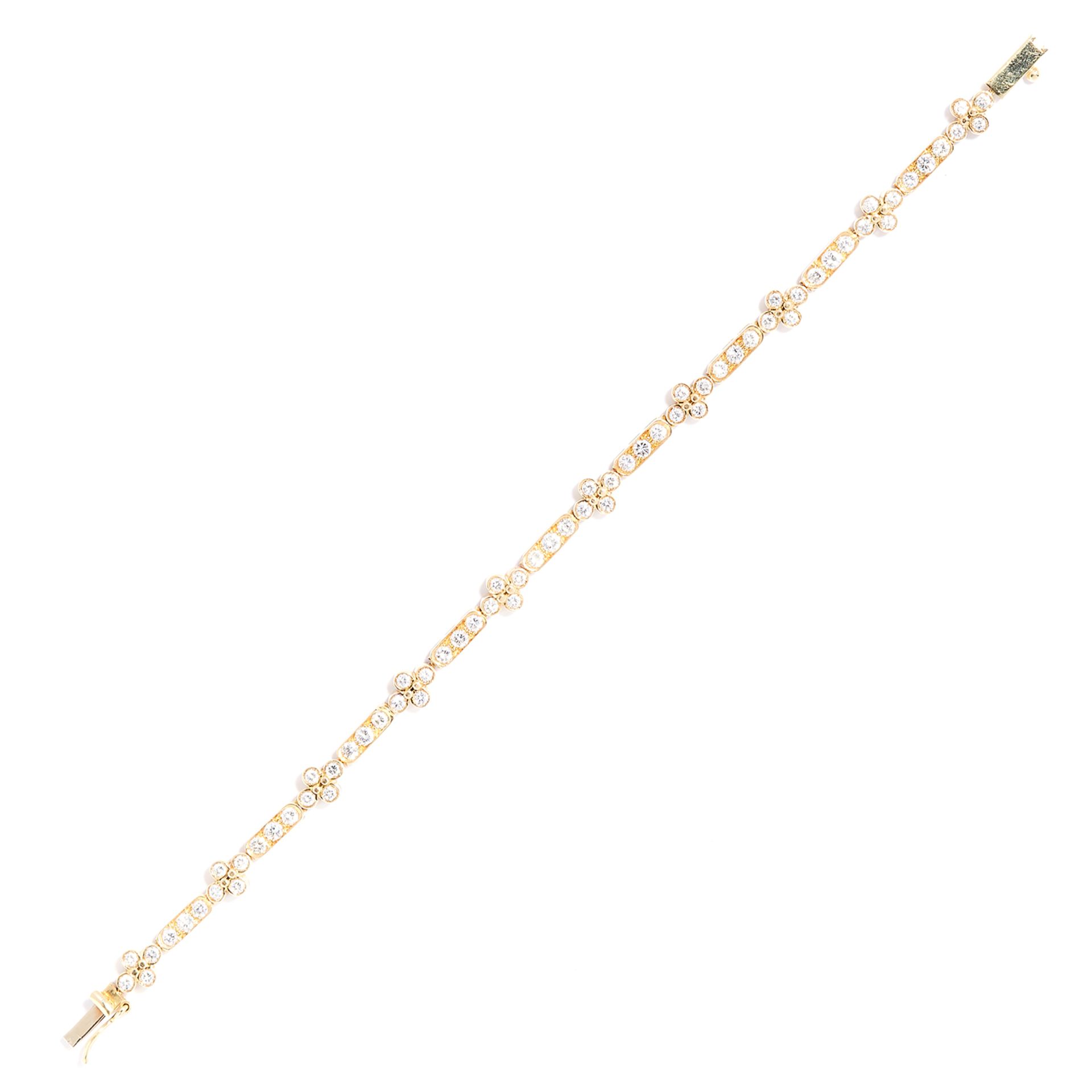 DIAMOND LINE BRACELET in 18ct yellow gold, set with round cut diamonds totalling approximately 3.