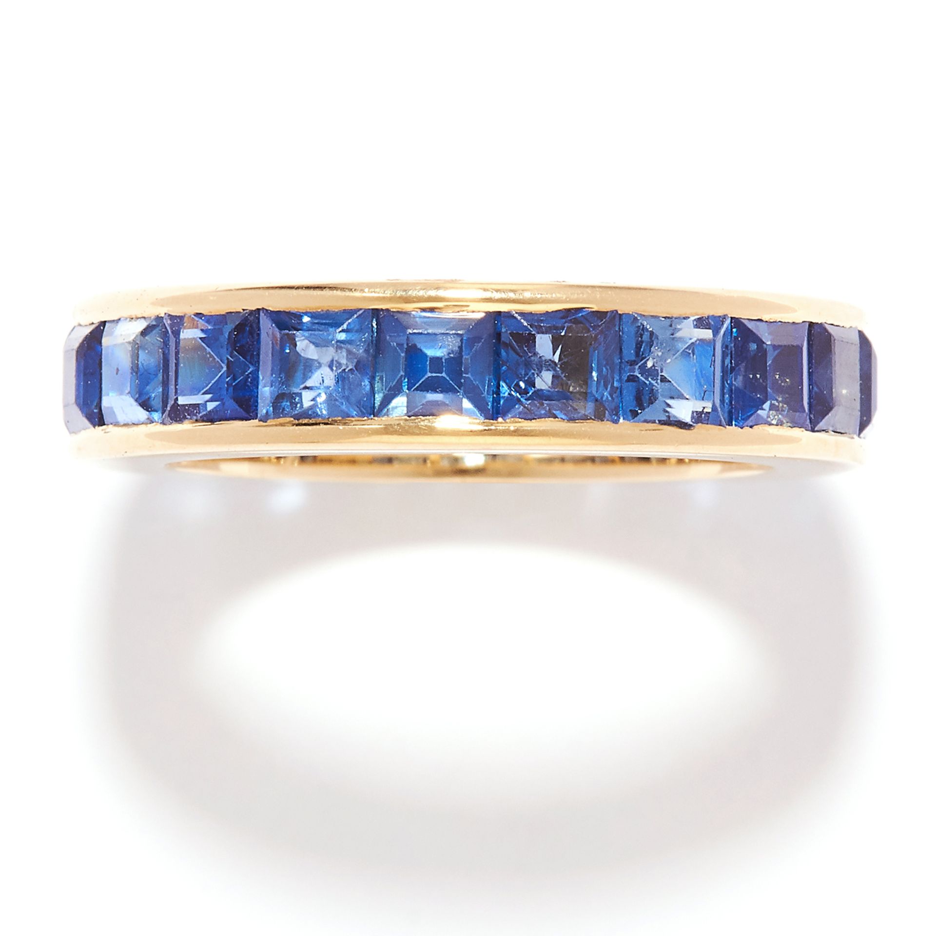 SAPPHIRE ETERNITY BAND RING in 18ct yellow gold, set with square cut sapphires, British hallmarks,