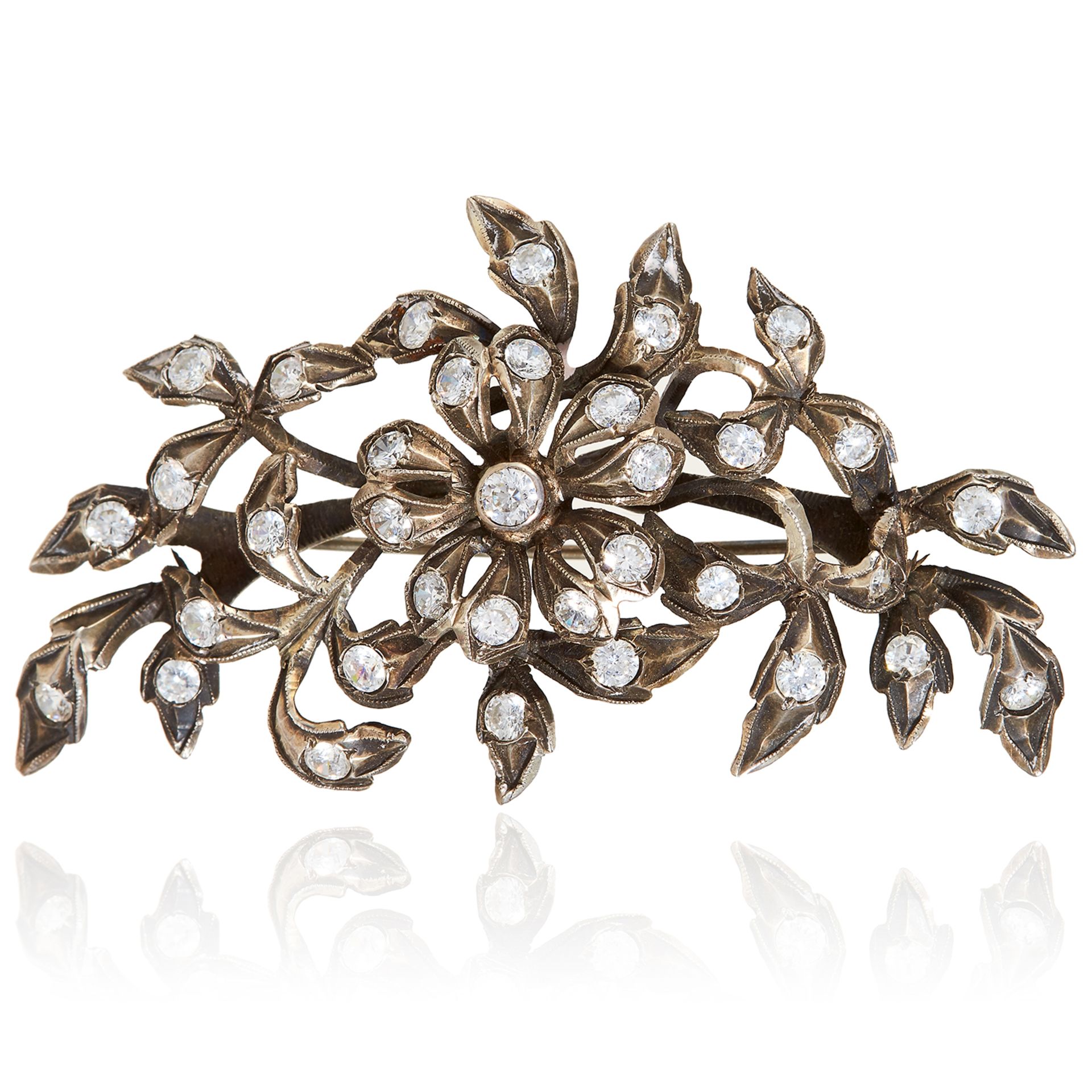 A PASTE FLORAL SPRAY BROOCH in silver, designed as a floral spray, jewelled with round cut paste