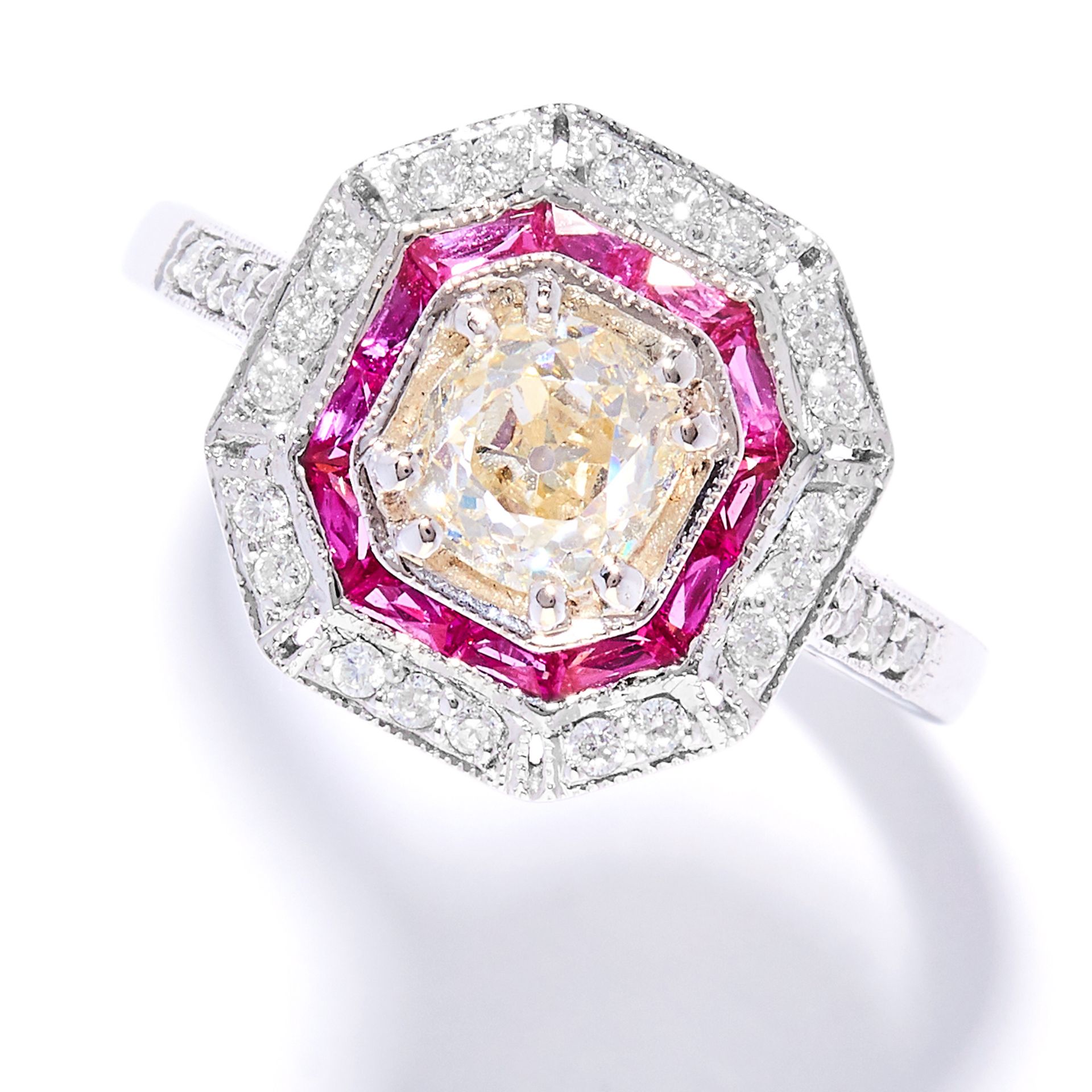 DIAMOND AND RUBY DRESS RING in 18ct white gold, in Art Deco design, set with an old cut diamond of