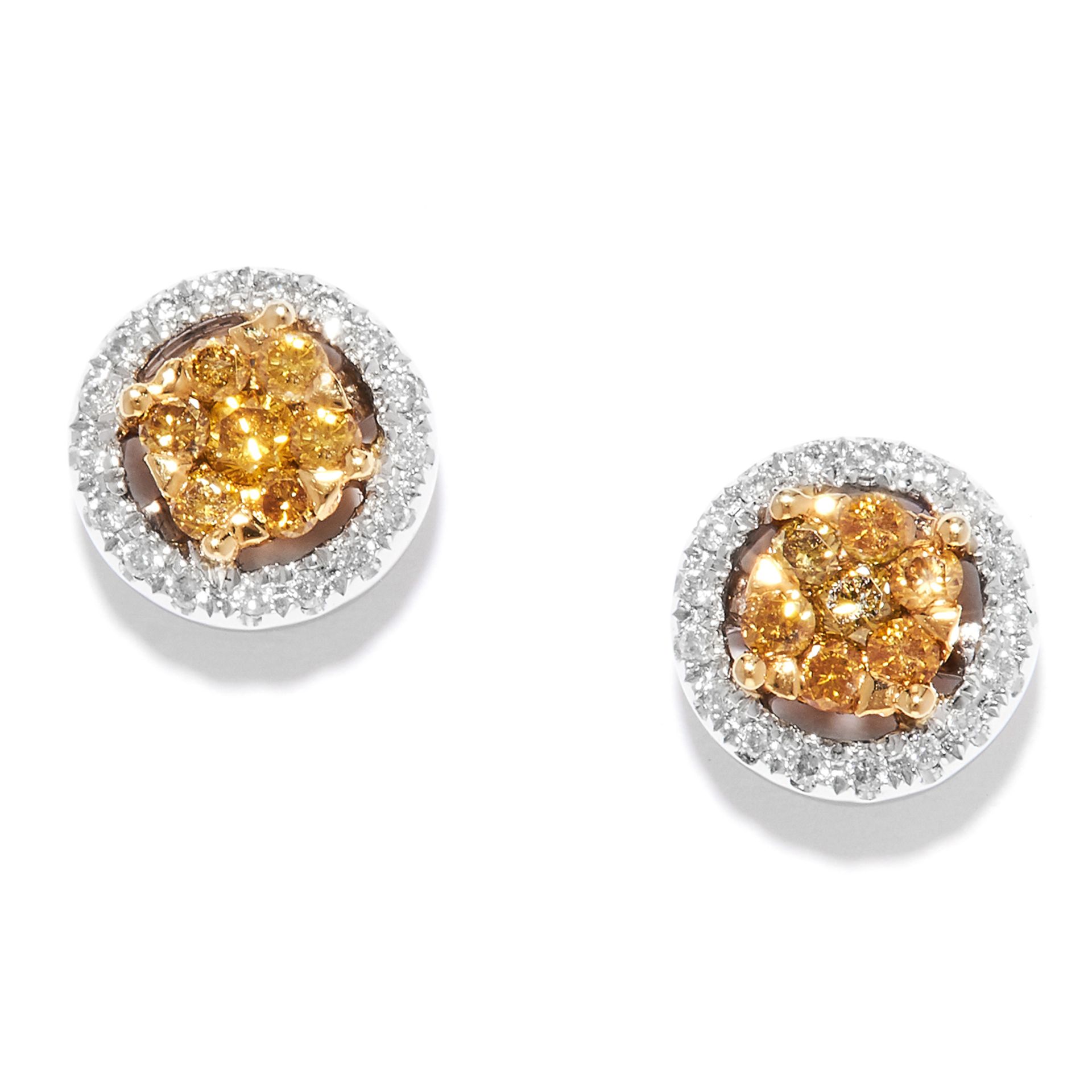 YELLOW AND WHITE DIAMOND STUD EARRINGS in 18ct gold, set with clusters of yellow diamonds within