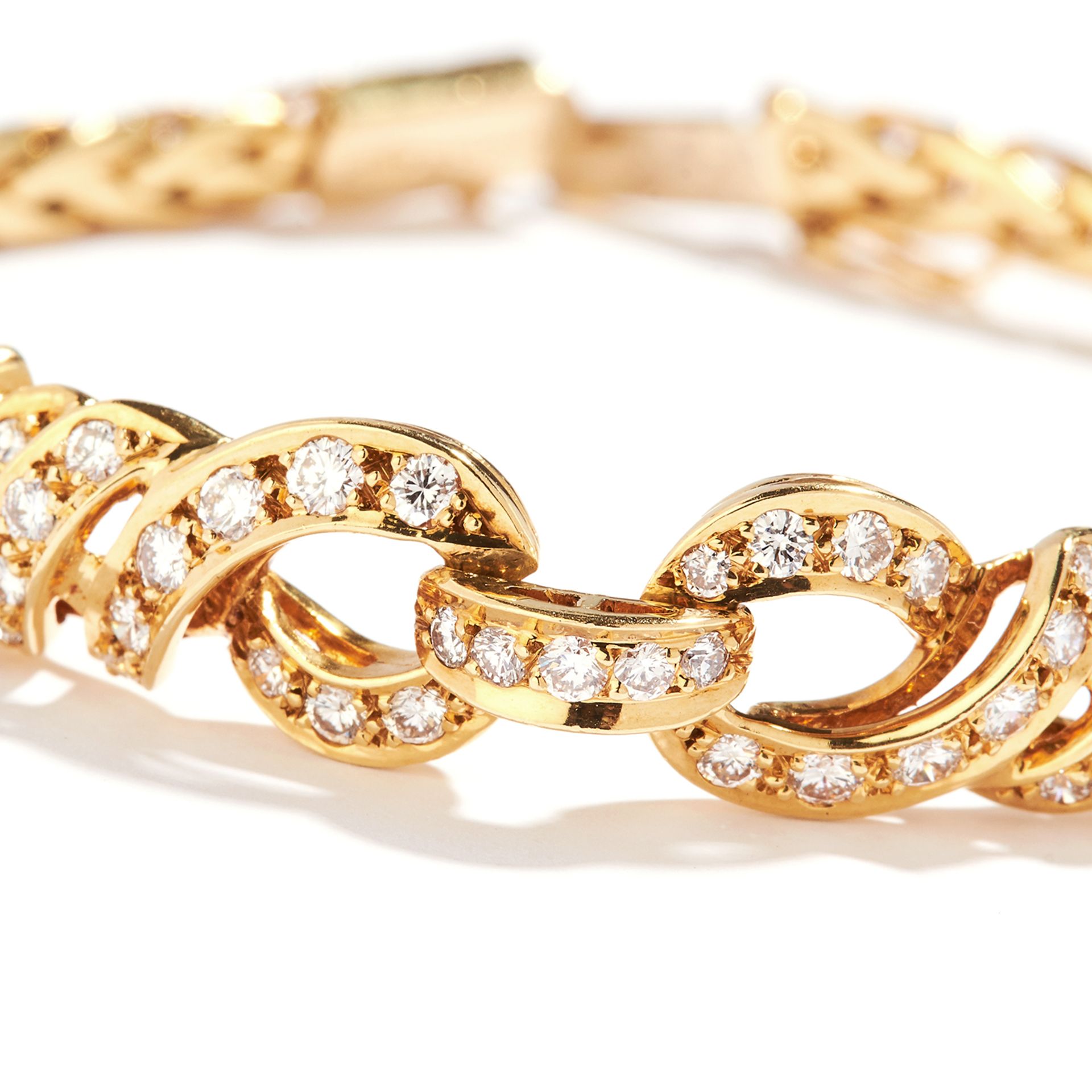 DIAMOND FANCY LINK BRACELET, BULGARI in 18ct yellow gold, the central interlocking motif set with - Image 2 of 2