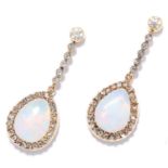 OPAL AND DIAMOND CLUSTER EARRINGS in high carat yellow gold, each set with a row of round cut