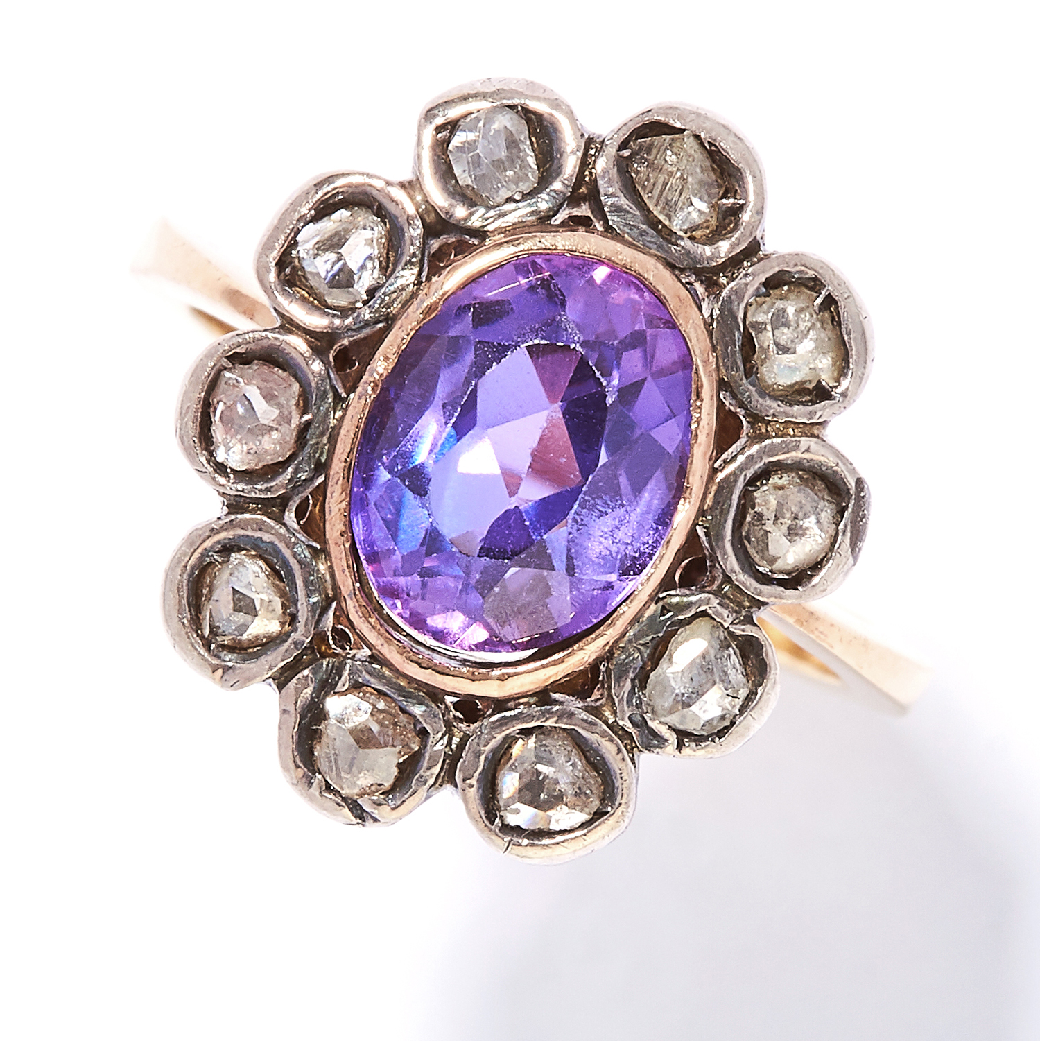 AMETHYST AND DIAMOND RING in yellow gold and silver, oval cut amethyst encircled by rose cut
