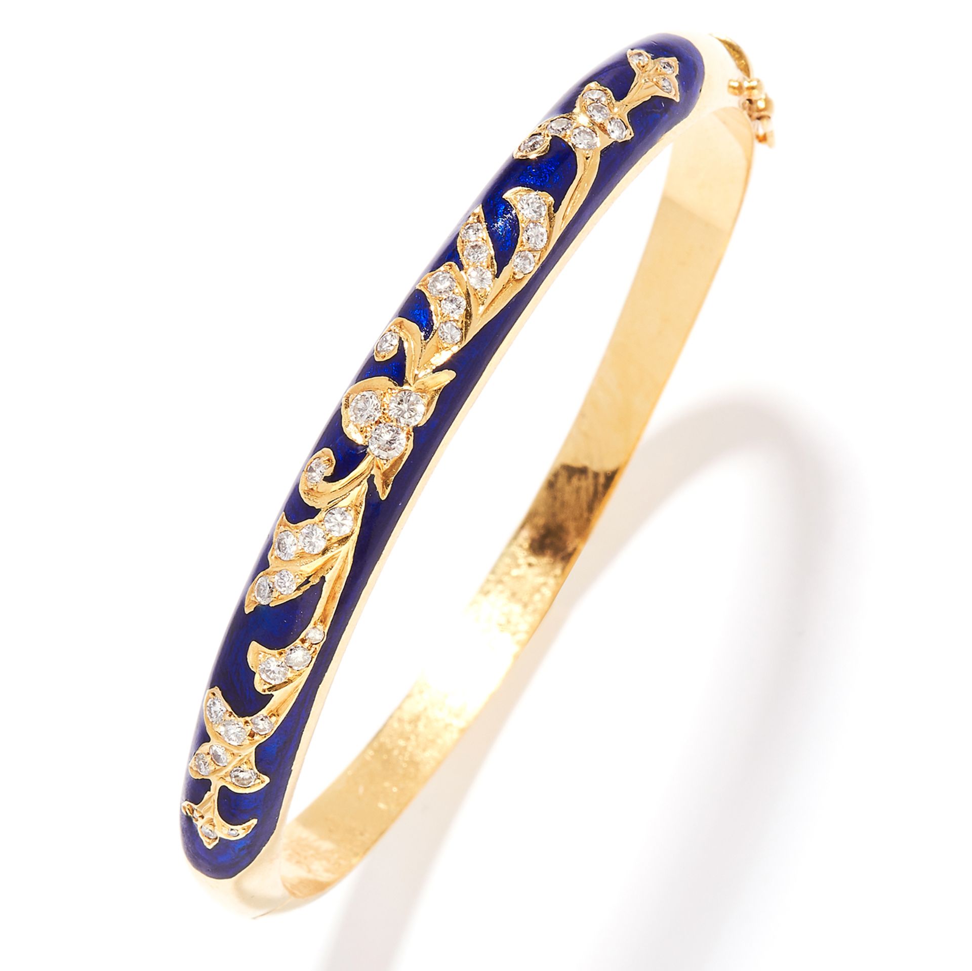 DIAMOND AND ENAMEL BANGLE in 18ct yellow gold, the graduated, rounded hoop jewelled with round cut