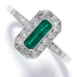 EMERALD AND DIAMOND DRESS RING in platinum, set with an emerald cut emerald in a cluster of old